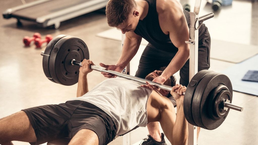 A men exercise in gym for fitness and exercise guide
