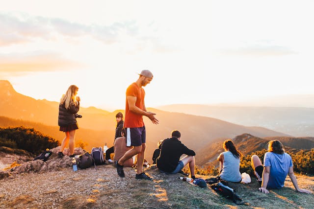 Travelers enjoying adventure-packed getaways in stunning mountain landscapes
