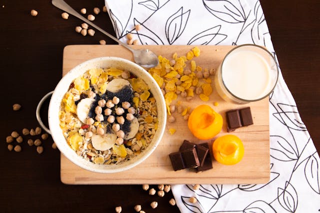 Balanced plant-based snacks for mid-day energy including fruits, nuts, and whole foods beautifully arranged for a healthy lifestyle