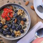Plant-based yogurt parfait with berries and hemp seeds – ideal balanced plant-based snacks for mid-day energy.