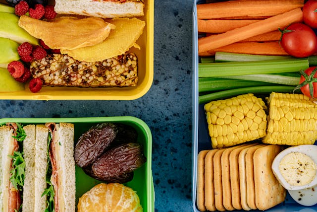 Meal prep containers filled with colourful nutrient - dense diet foods 