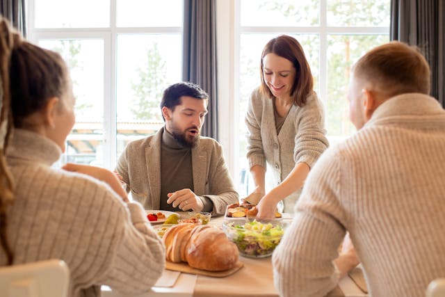 Family enjoying everyday high-protein foods together at the dining table
