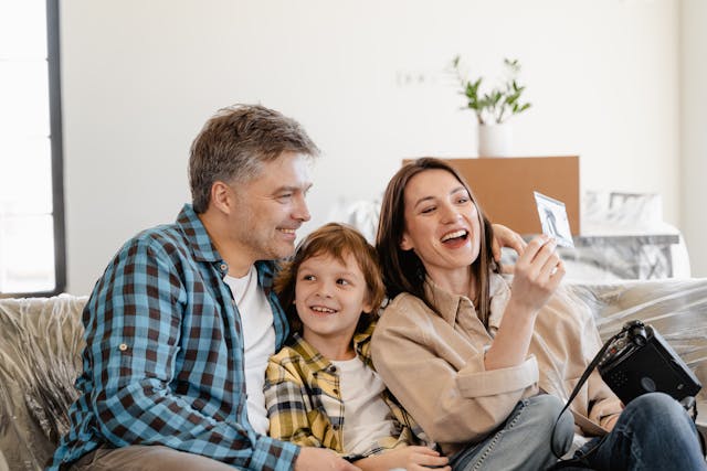 Final thoughts on home organization hacks for busy moms with a happy mother relaxing in a well-organized home