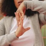 Desk yoga stretch routine include finger stretch for office workers 