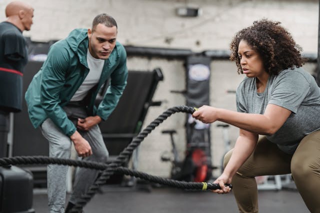 Man performing functional training exercises for real-life strength and mobility