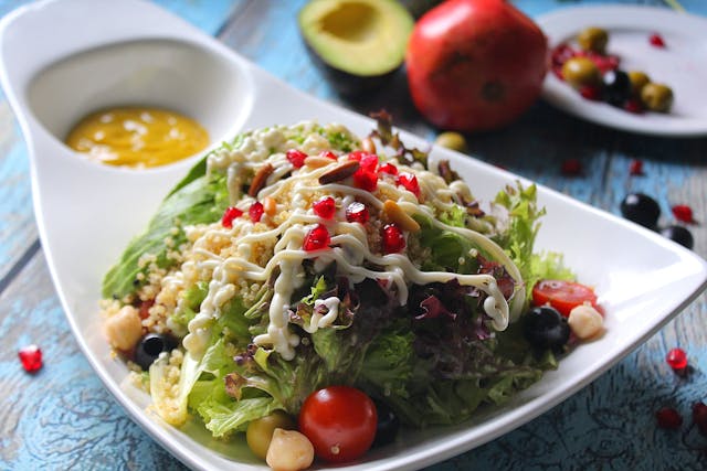 A colorful bowl of healthy nutrient-dense meals with fresh vegetables and grains