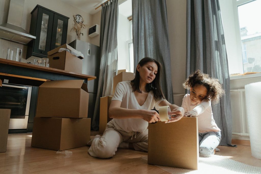 Home organization hacks for busy moms showing a mother managing household tasks with kids in a tidy space