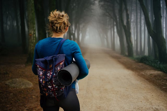 Road leading into distance symbolizing long term effort and growth mindset motivation 