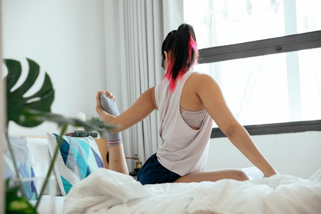 Person starting a simple daily fitness routine at home in the morning for better health and energy```