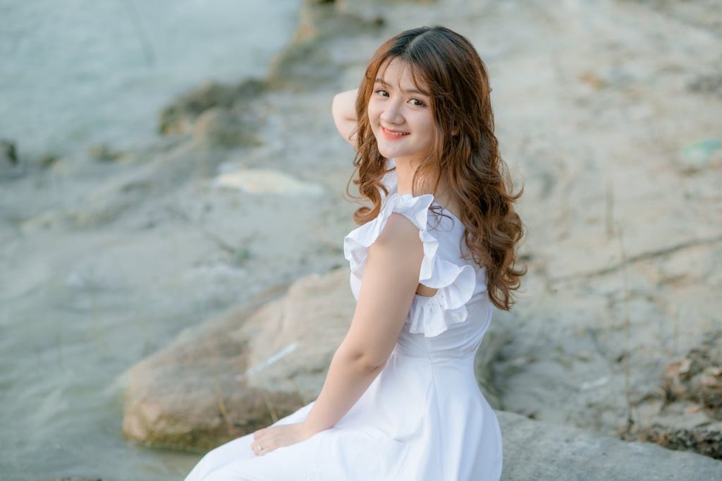 Woman with glowing skin following natural skin brightening tips for radiant complexion