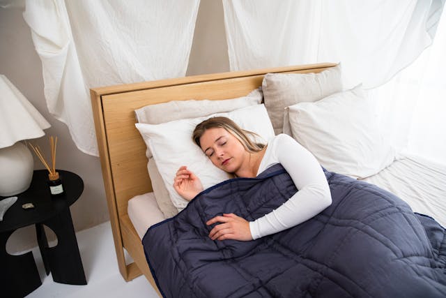 Natural sleep mental wellness tips - peaceful sleeping women representing mind - body harmony 