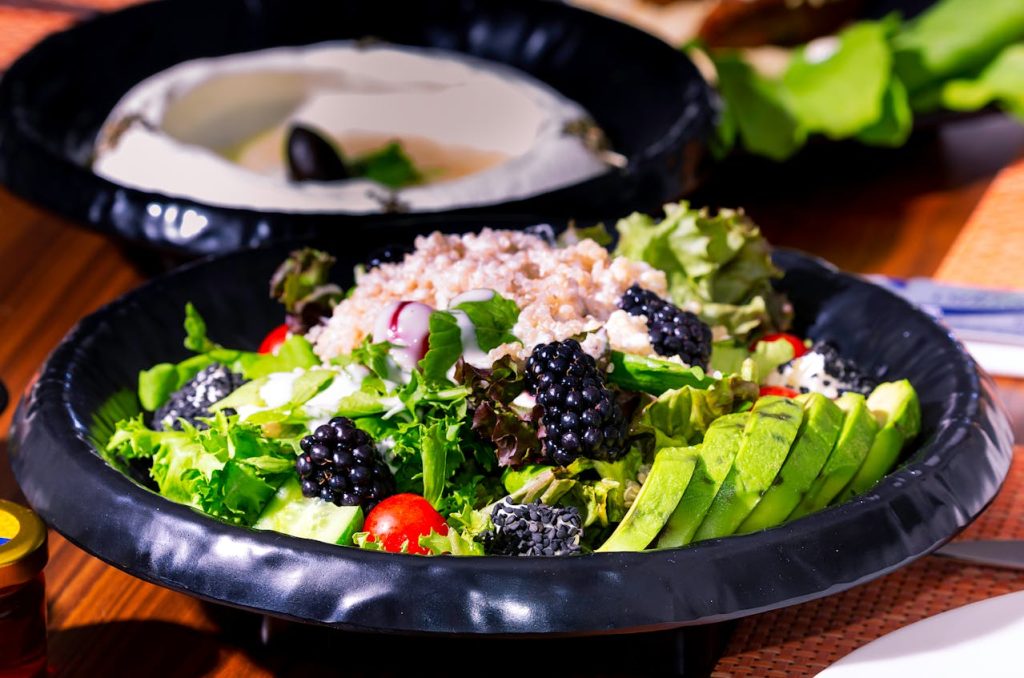 Colorful nutrient-dense meals with vegetables, grains, and proteins served on a table