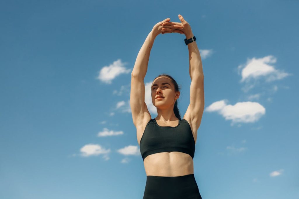 Woman following a simple daily fitness routine with home exercises for healthy lifestyle