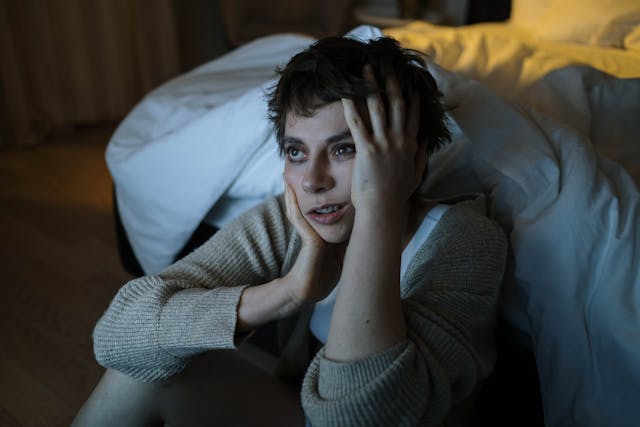 Stressed person suffering insomnia affecting sleep quality and emotional well being 