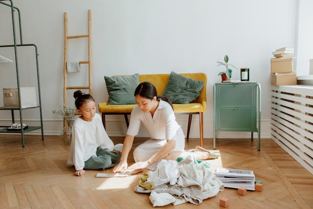 Home organization hacks for busy moms highlighting a mother managing daily chores with clarity and planning
