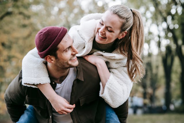 Happy couple sharing a supportive moment representing Emotional Wellness in Relationships