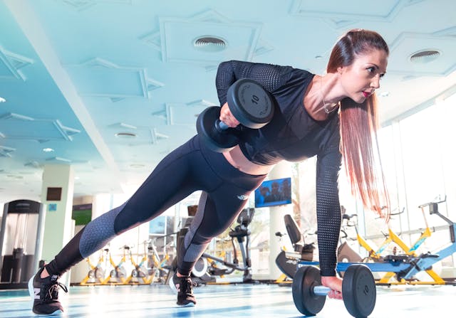 Person performing exercises better than crunches to build a strong and toned core