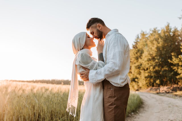 Couple embracing and smiling, showing how to manage stress in relationships and grow stronger emotionally