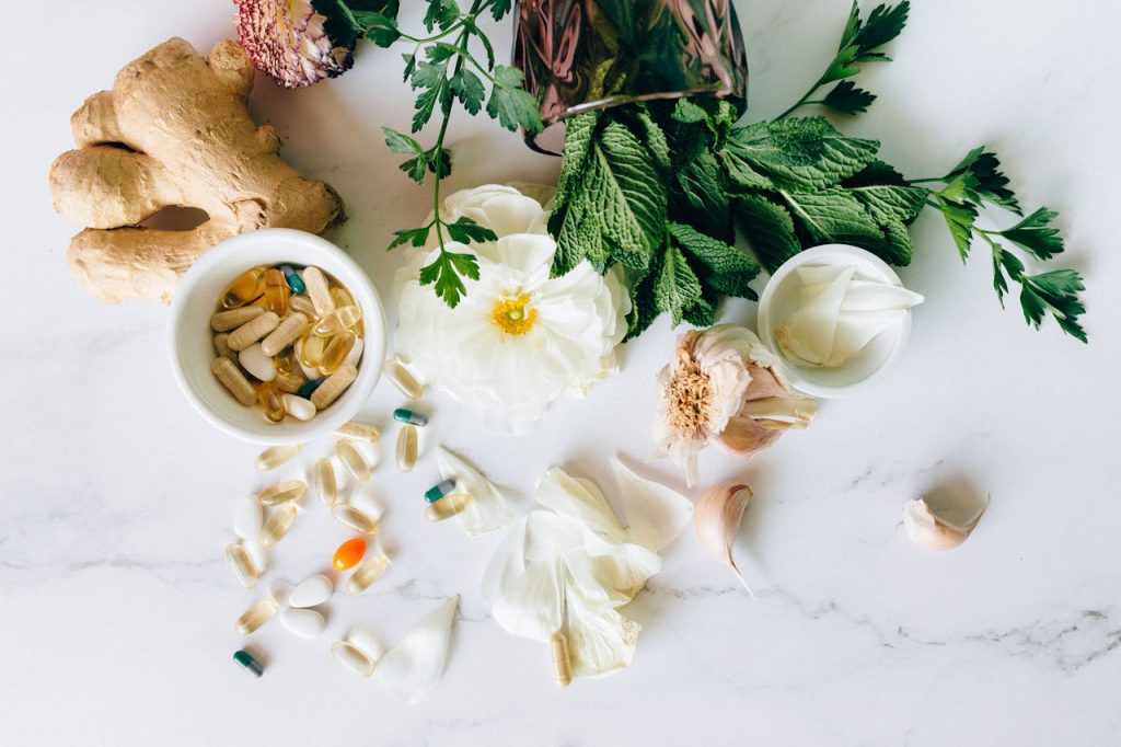Natural skin relief with herbal ingredients and organic remedies displayed on a wooden table
