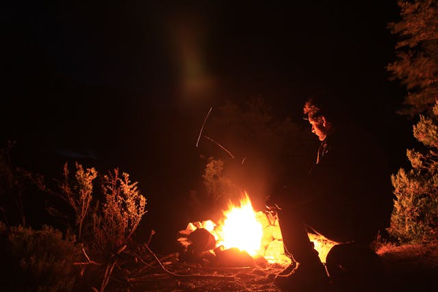 Campfire under starry sky after a day of Beaten-Path Adventure Trips
